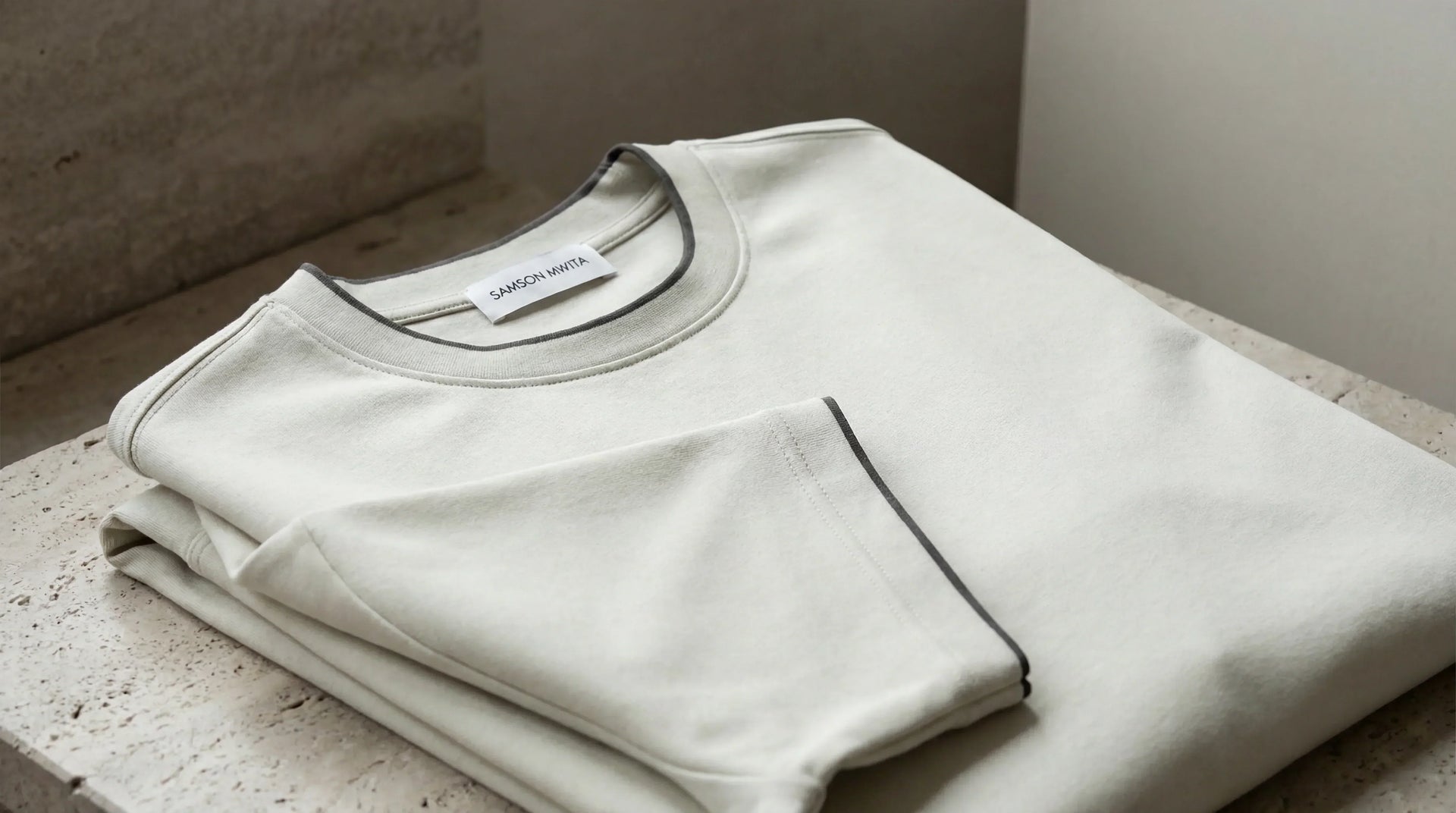 SM Sunwash T-shirt folded on pillar