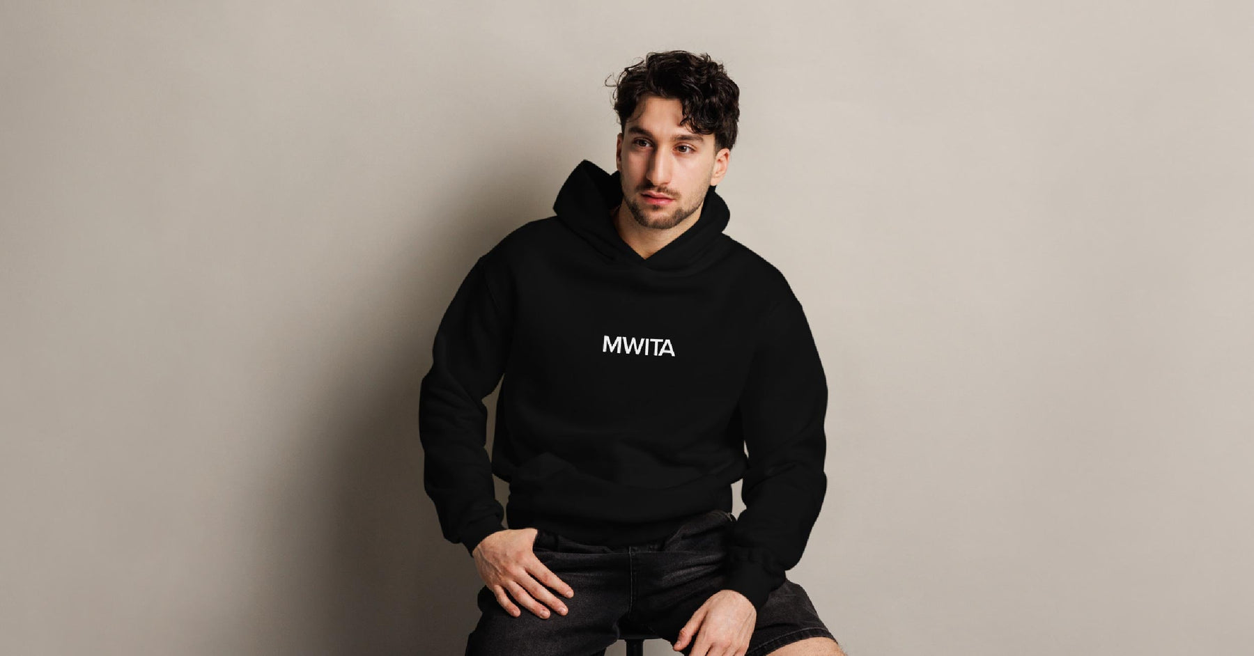 Model wearing SM Hoodie
