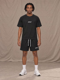 Model wearing the SM Motion Mesh T-shirt and SM Motion Mesh Shorts in black, front view.