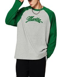 Model wearing SM Retro Raglan Long-Sleeve T-shirt green front