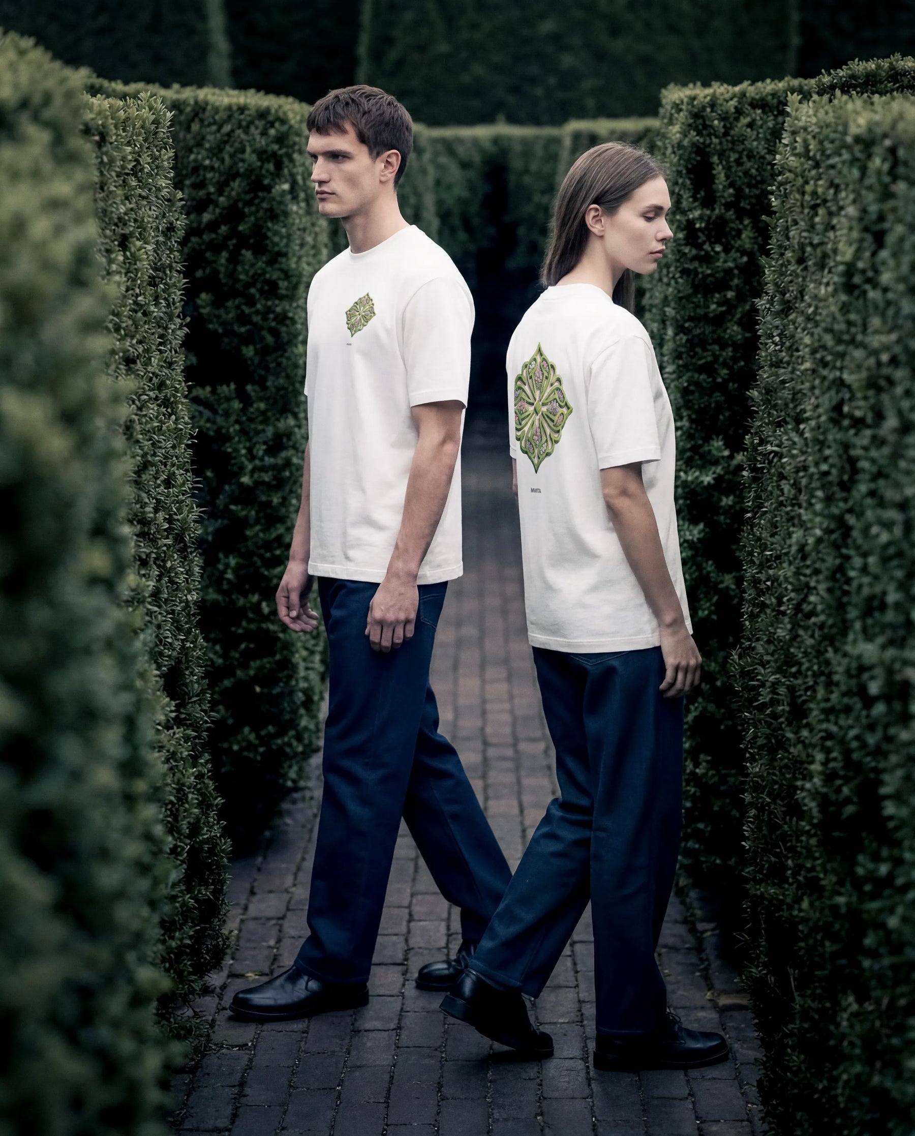 Two models wearing the SM Verdant T-shirt and Heritage Straight Leg Denim Jeans