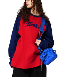 Model wearing SM Retro Raglan Long Sleeve