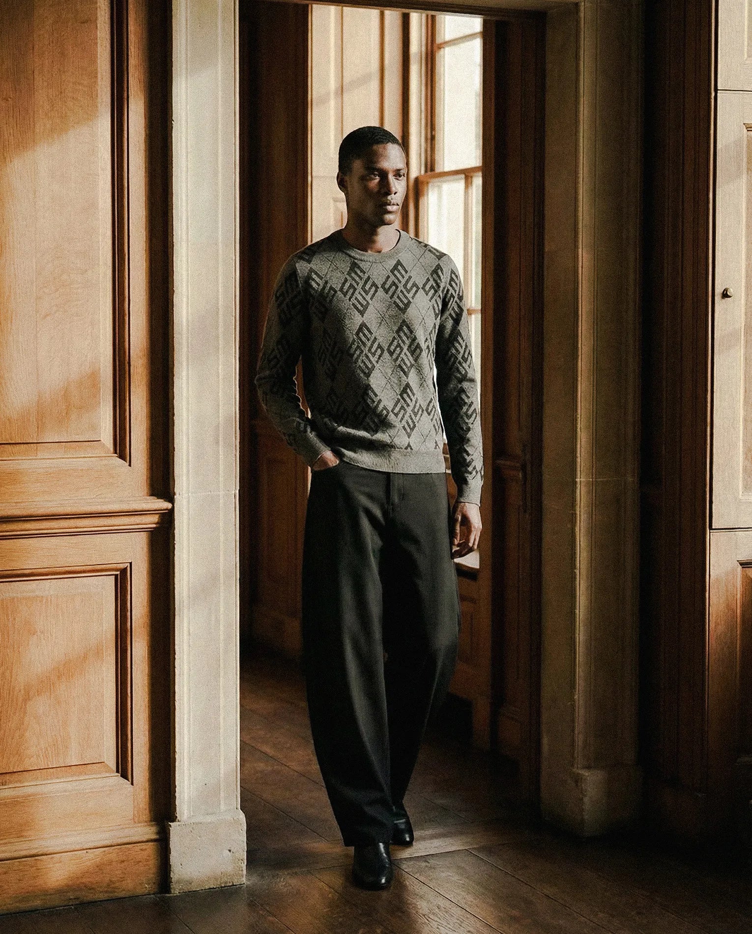 Model wearing SM Argyle Knit and Curved Trousers
