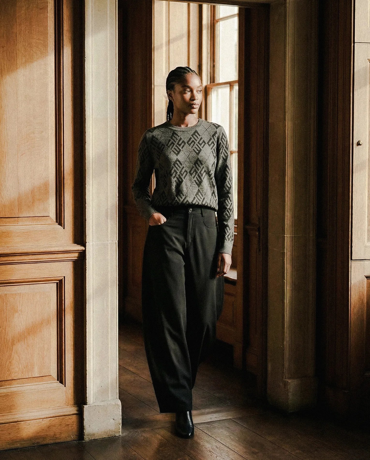 Model wearing SM Argyle Knit and Curved Trousers