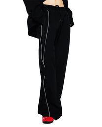 Model wearing SM Fleur Eclipse Sweatpants black front