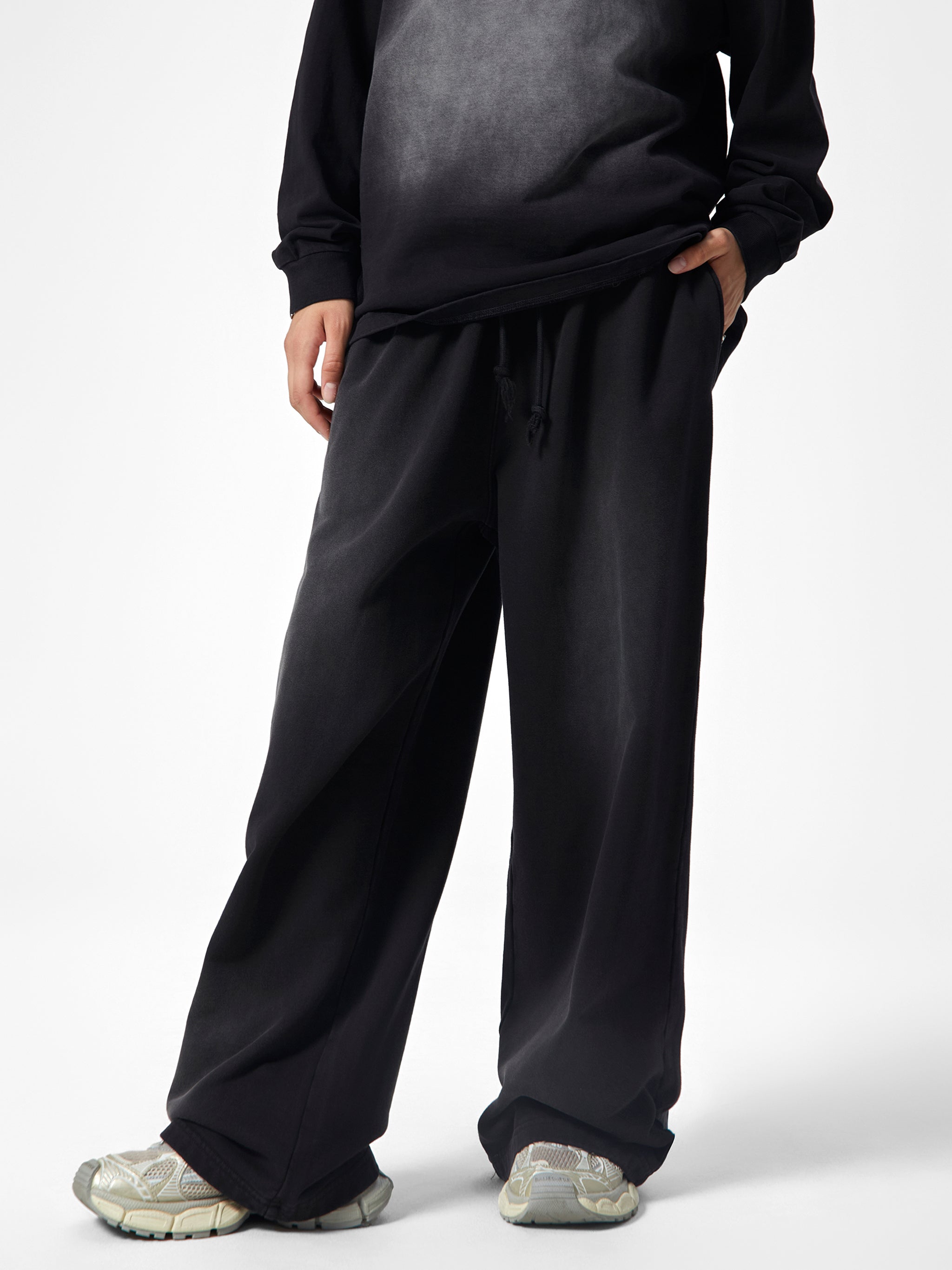 model wearing SM Monkey Wash Sweatpants front