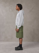Model wearing SM Sig. Full-Zip Boxy Hoodie in Floral Grey, side view.