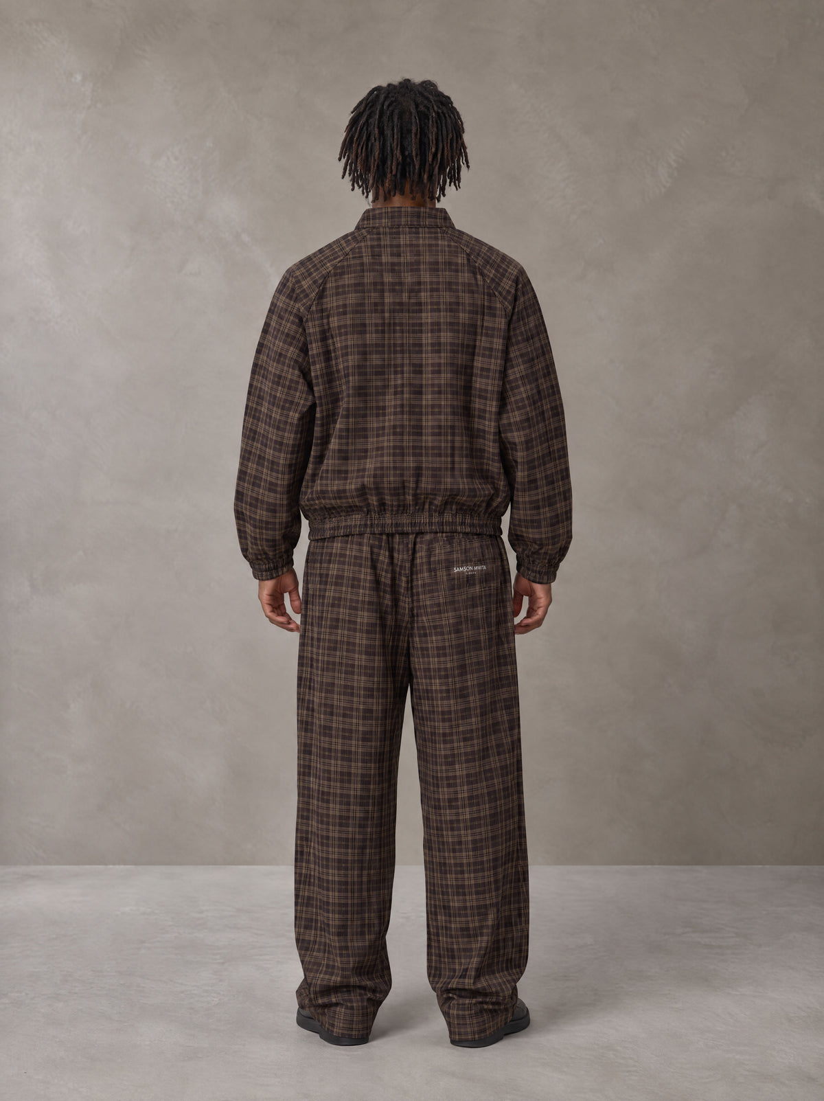 SM Meridian Espresso outfit, full-length rear studio view, Look 1.