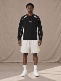 Model wearing SM Motion Sweatshirt in Midnight Black, front view.