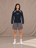 Model wearing SM Motion Sweatshirt in Oxford Navy, front view.