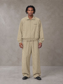 Model wearing the SM Meridian Jacket and SM Meridian Trousers in Ecru, front view.