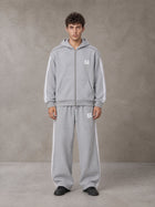 Model wearing the SM Contour Line Zip Hoodie and SM Contour Line Sweatpants in Floral Grey, front view.