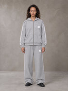 Model wearing the SM Contour Line Zip Hoodie and SM Contour Line Sweatpants in Floral Grey, front view.