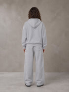 Model wearing the SM Contour Line Zip Hoodie and SM Contour Line Sweatpants in Floral Grey, rear view.