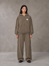 Model wearing the SM Arc Hoodie and SM Arc Sweatpants in Deep Coffee, front view.