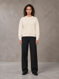 Model wearing SM Straight Leg Trousers in Midnight Black, front view.