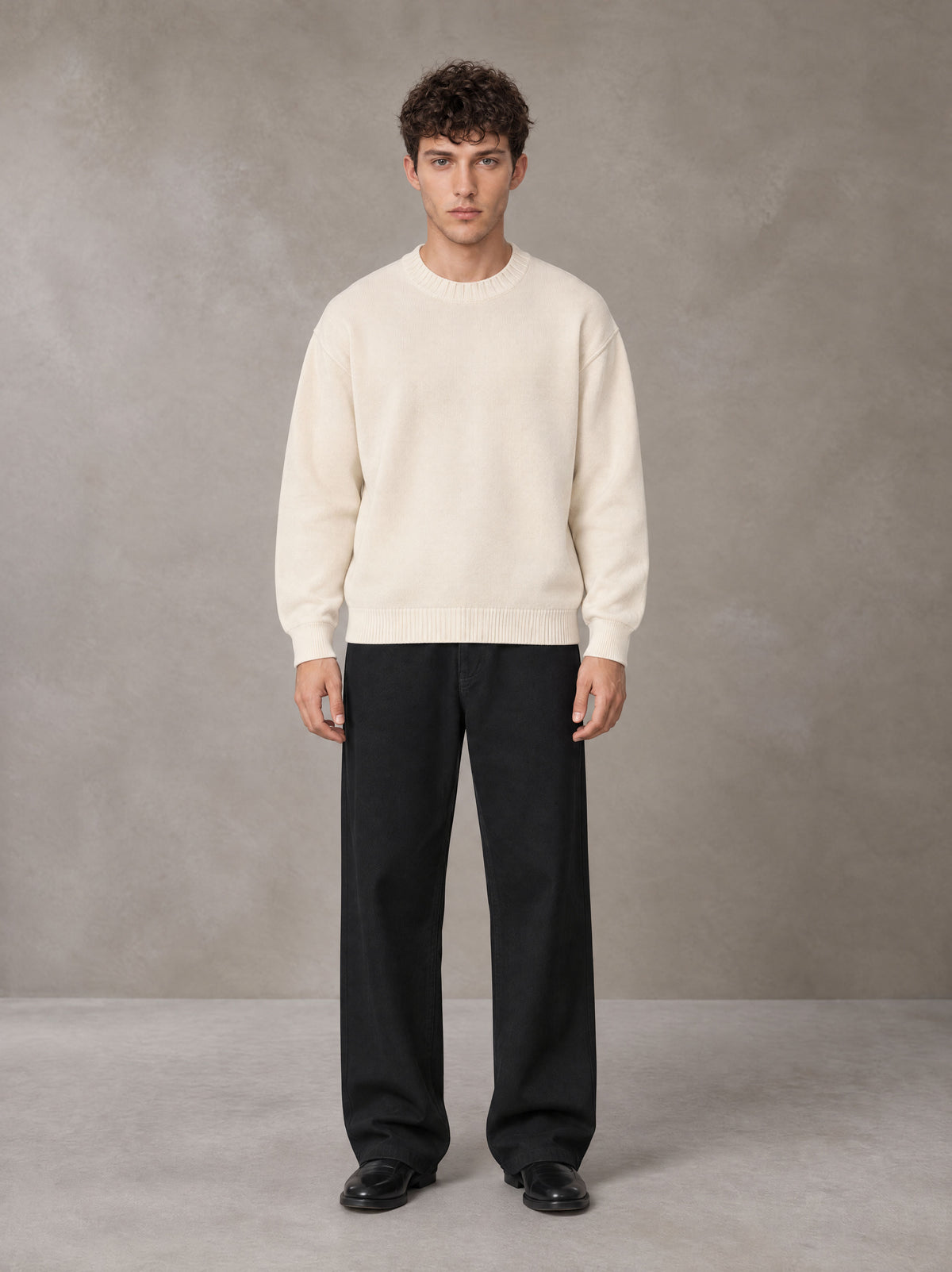 Model wearing SM Straight Leg Trousers in Midnight Black, front view.