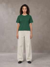 Model wearing SM Straight Leg Trousers in Oat Grey, front view.