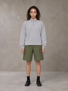 Model wearing SM Sig. Half-Zip Fleece Sweatshirt in Floral Grey, front view.