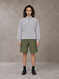 Model wearing SM Sig. Half-Zip Fleece Sweatshirt in Floral Grey, front view.