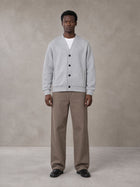 Model wearing SM Sig. Cardigan in Floral Grey, front view.