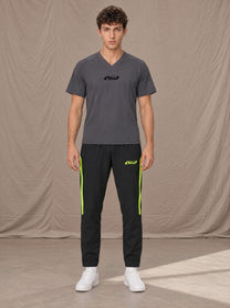 Model wearing SM Motion Stripe Track Trousers in Midnight Black, front view.