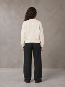 Model wearing SM Straight Leg Trousers in Midnight Black, rear view.