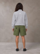 Model wearing SM Sig. Half-Zip Fleece Sweatshirt in Floral Grey, rear view.