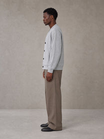 Model wearing SM Sig. Cardigan in Floral Grey, side view.
