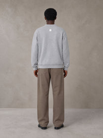 Model wearing SM Sig. Cardigan in Floral Grey, rear view.