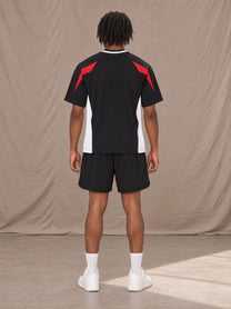 Model wearing SM Motion Vector Jersey in Midnight Black, rear view.