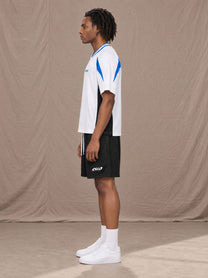 Model wearing SM Motion Vector Jersey in Lucent White, side view.
