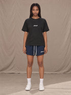 Model wearing the SM Motion Mesh Shorts in Oxford Navy, front view.