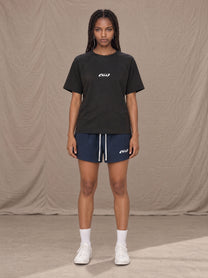 Model wearing the SM Motion Mesh Shorts in Oxford Navy, front view.