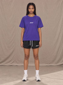 Model wearing the SM Motion Mesh T-shirt in Rich Violet, front view.