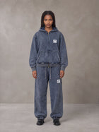 Model wearing the SM Denim Wash Zip Hoodie in Oxford Navy, front view.