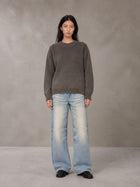 Model wearing the SM Heritage Fade Wide Leg Jeans in Cadet Grey, front view.