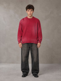 Model wearing the SM Sig. Washed Distress Knit Sweater in Deep Carmine, front view.