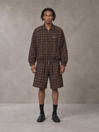 Model wearing the SM Meridian Shorts in Espresso, front view.
