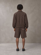 Model wearing the SM Meridian Shorts in Espresso, rear view.