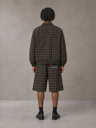 Model wearing the SM Meridian Shorts in Loden, rear view.
