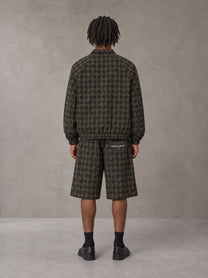 Model wearing the SM Meridian Shorts in Loden, rear view.