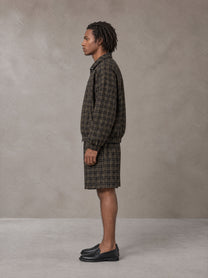 Model wearing the SM Meridian Shorts in Loden, side profile.