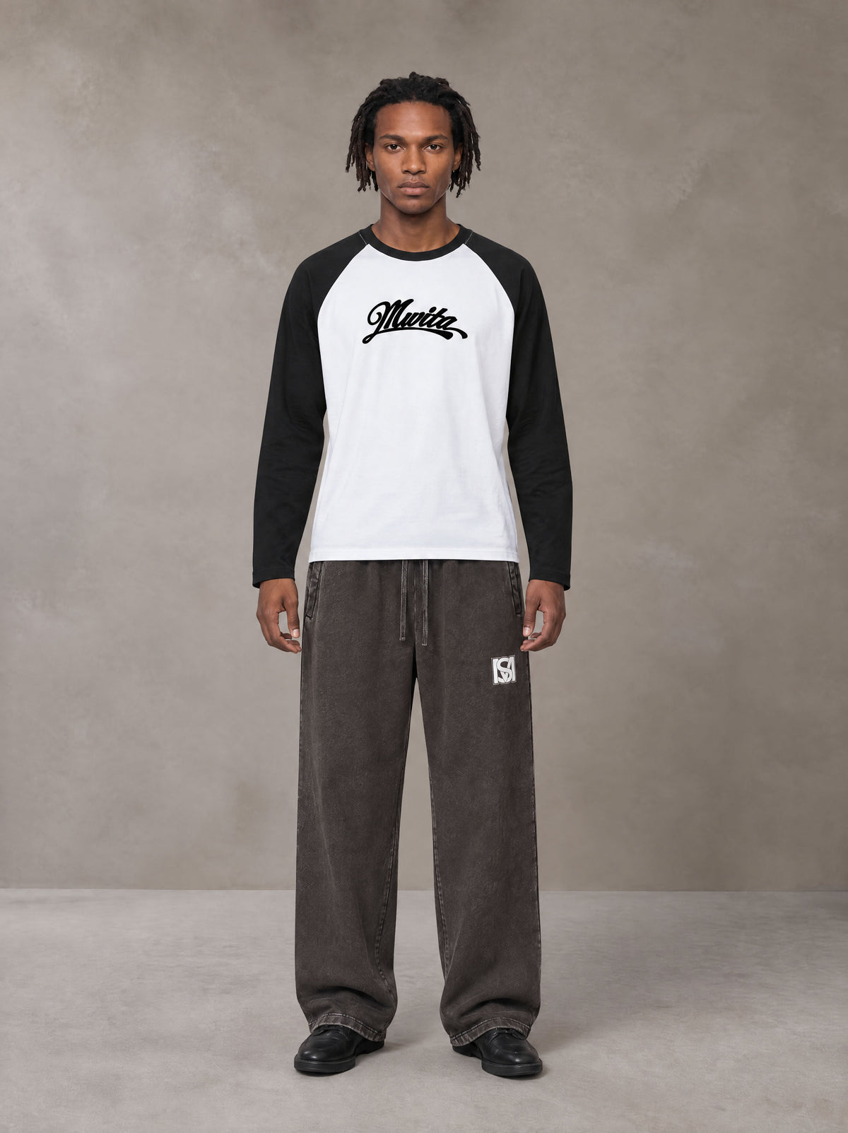 Model wearing SM Retro Raglan Long-Sleeve T-shirt in Lucent White, front view.