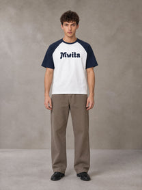 Model wearing SM Retro Raglan T-shirt in Oxford Navy, front view.
