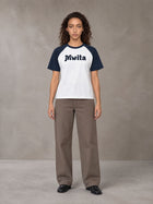Model wearing SM Retro Raglan T-shirt in Oxford Navy, front view.