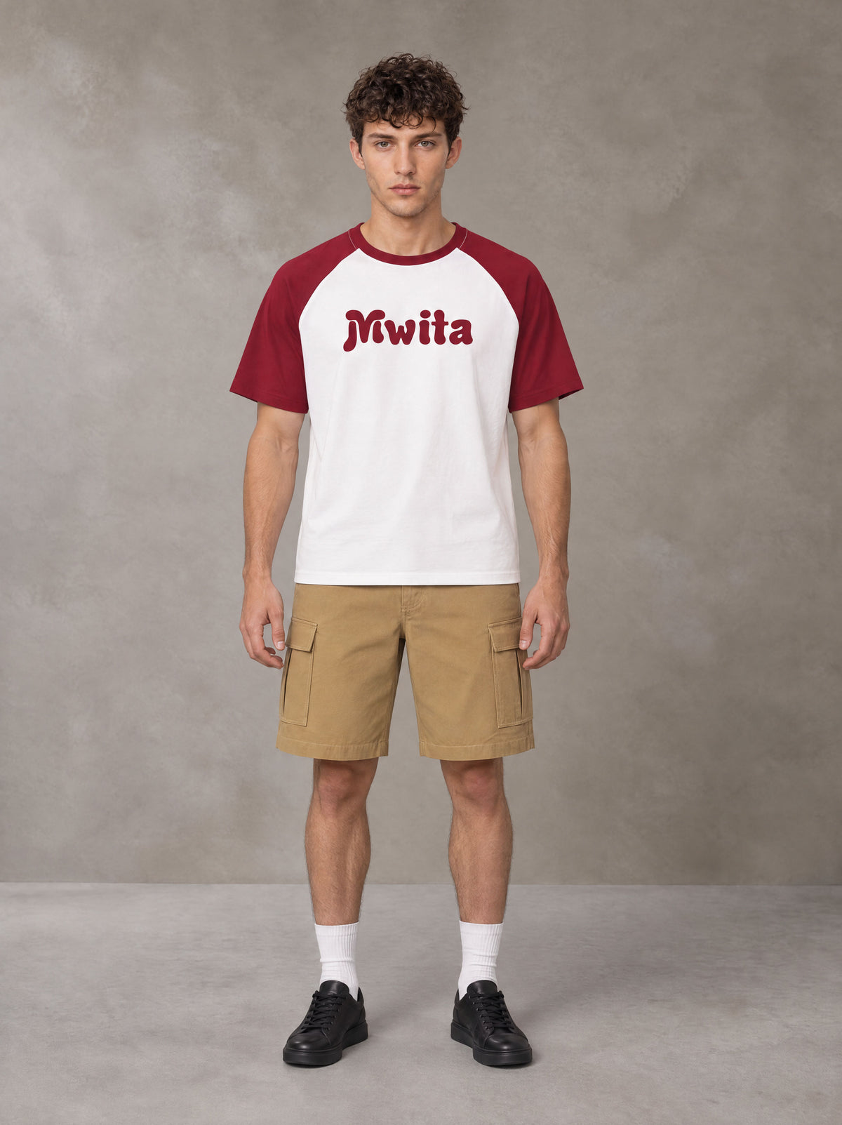 Model wearing SM Retro Raglan T-shirt in Burgundy, front view.