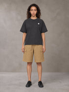 Model wearing SM Sig. Earth T-shirt in Deep Charcoal, front view.