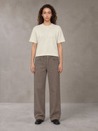 Model wearing SM Sig. Knitted Round Neck T-shirt in Neutral Heather, front view.