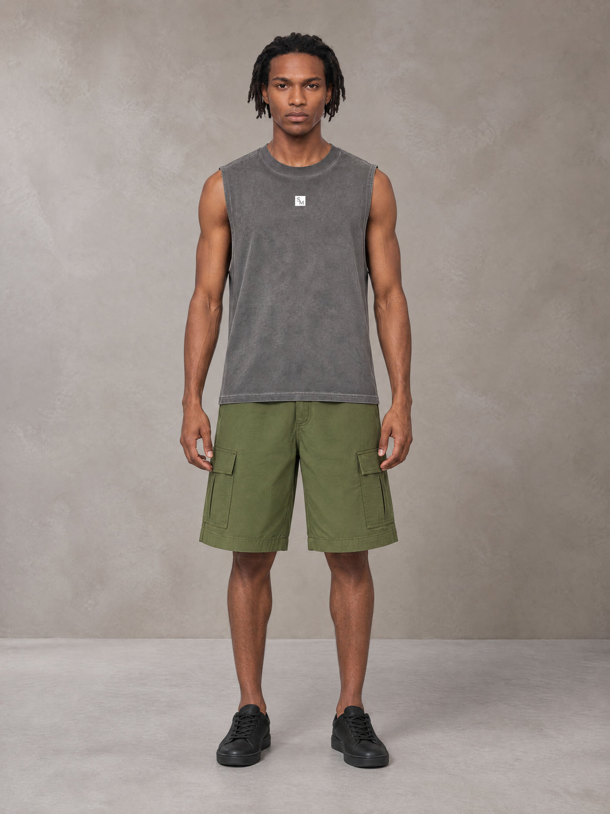 Model wearing SM Sig. Reverse Washed Tank Top in Pure Grey, front view.